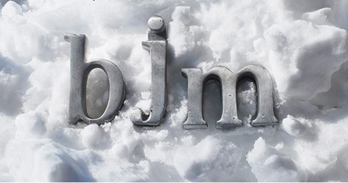 bjm in gray letters with snow background